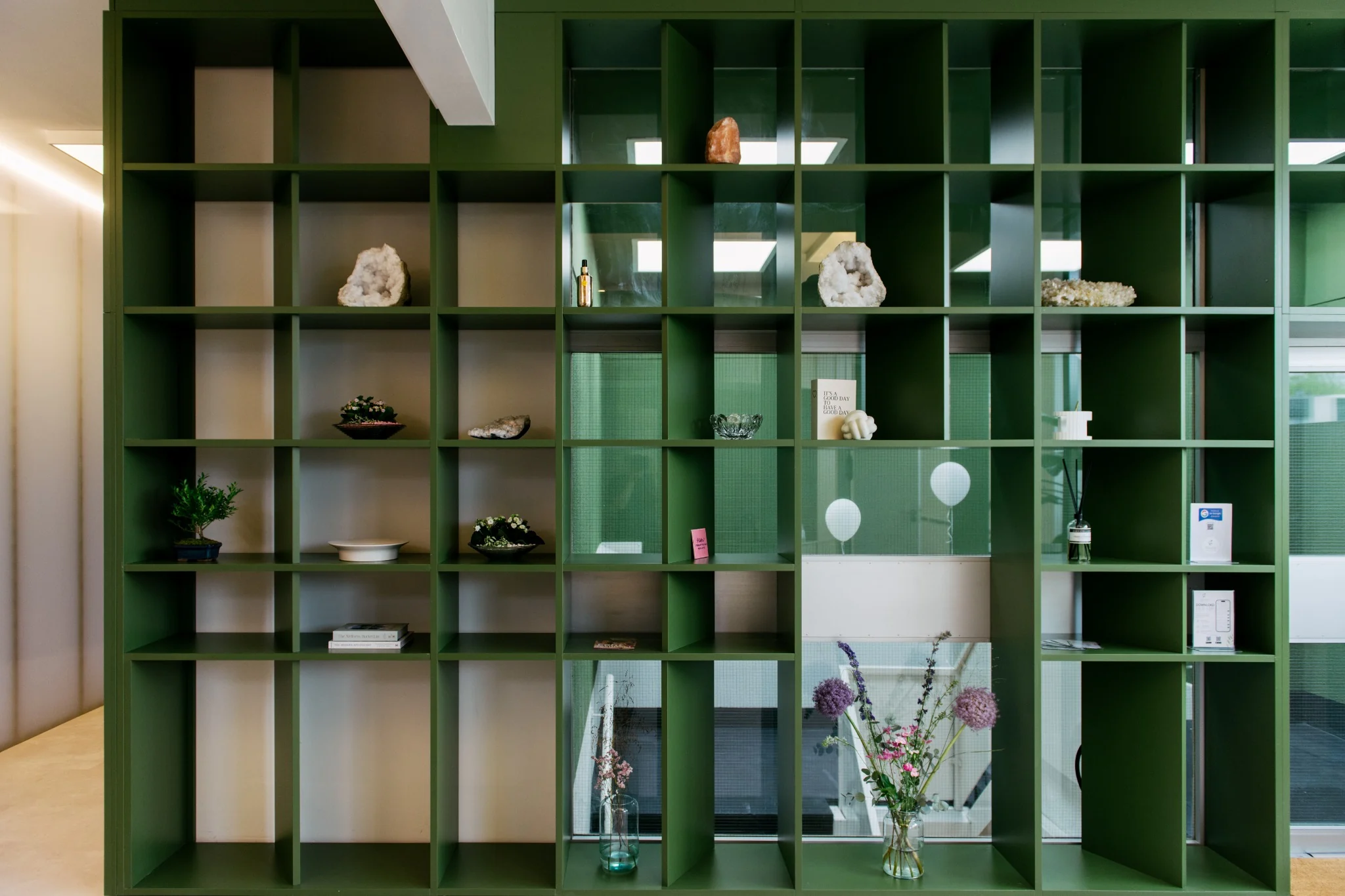 Green shelving in a commercial interior